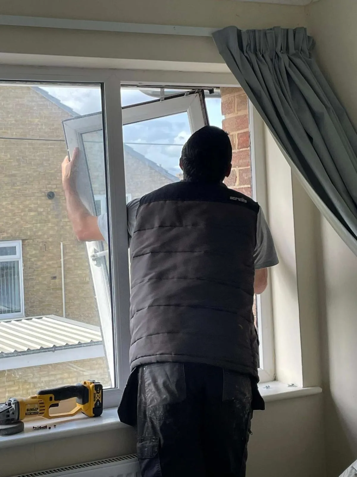 Everglaze fitter installing a new double glazed window unit in a Portsmouth property